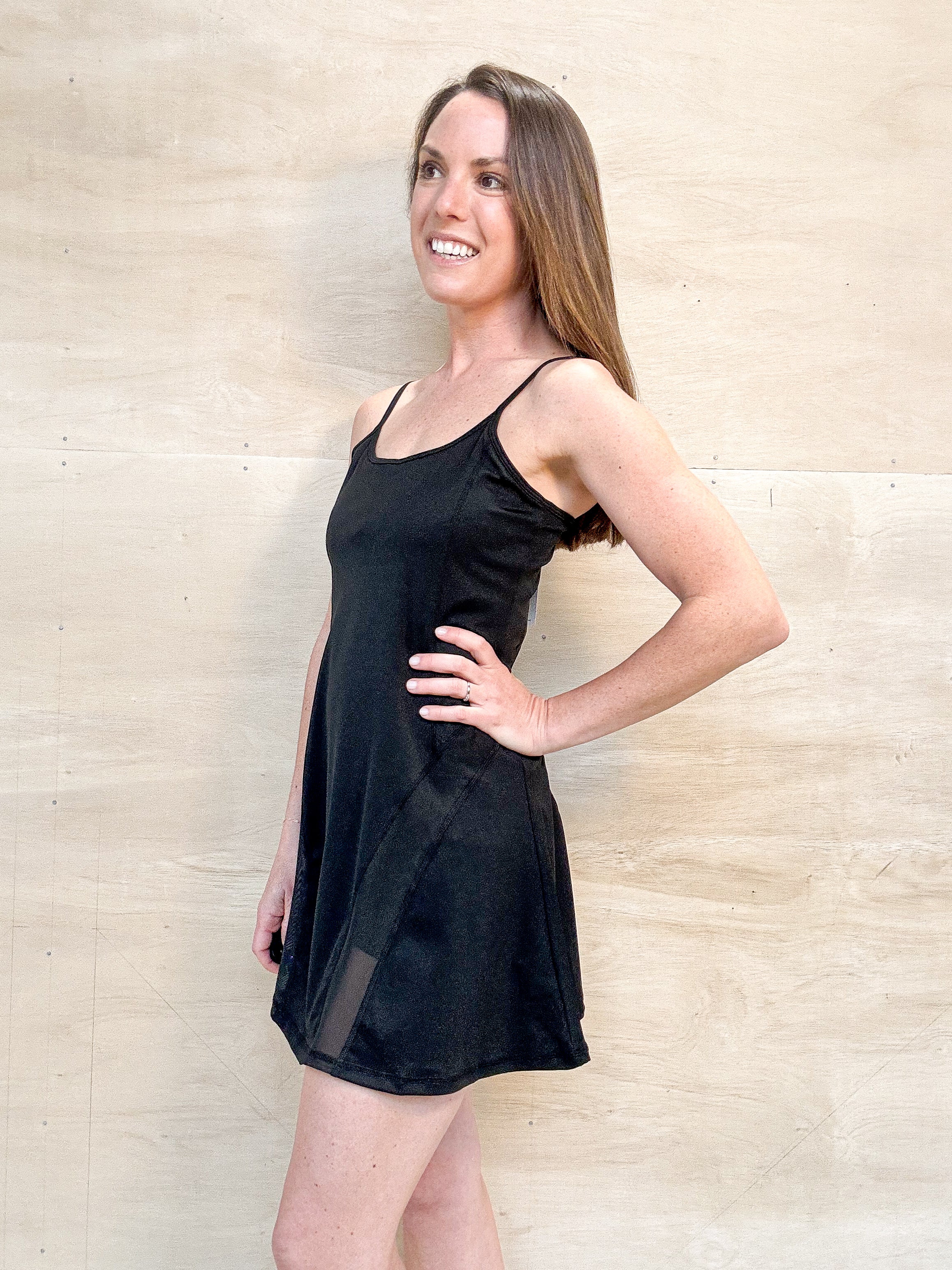 black mini dress, athletic dress, built in shorts, sheer panel, spaghetti straps, stretch material, black 