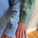 custom sweatshirt, embroidered mama on neckline, embroidered custom kids name on the sleeve, oversized fit