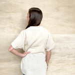 short sleeve, oversized relaxed gauze top, high low cut, longer in the back, side slit, v neckline