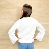 White crochet sweater, lightweight, long sleeve, v neck, star design throughout the sweater