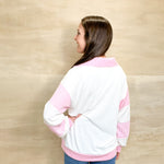 long sleeve polo top, pink stripe accents on the sleeve, pink collar neckline, oversized fit, soft top, balloon like sleeve