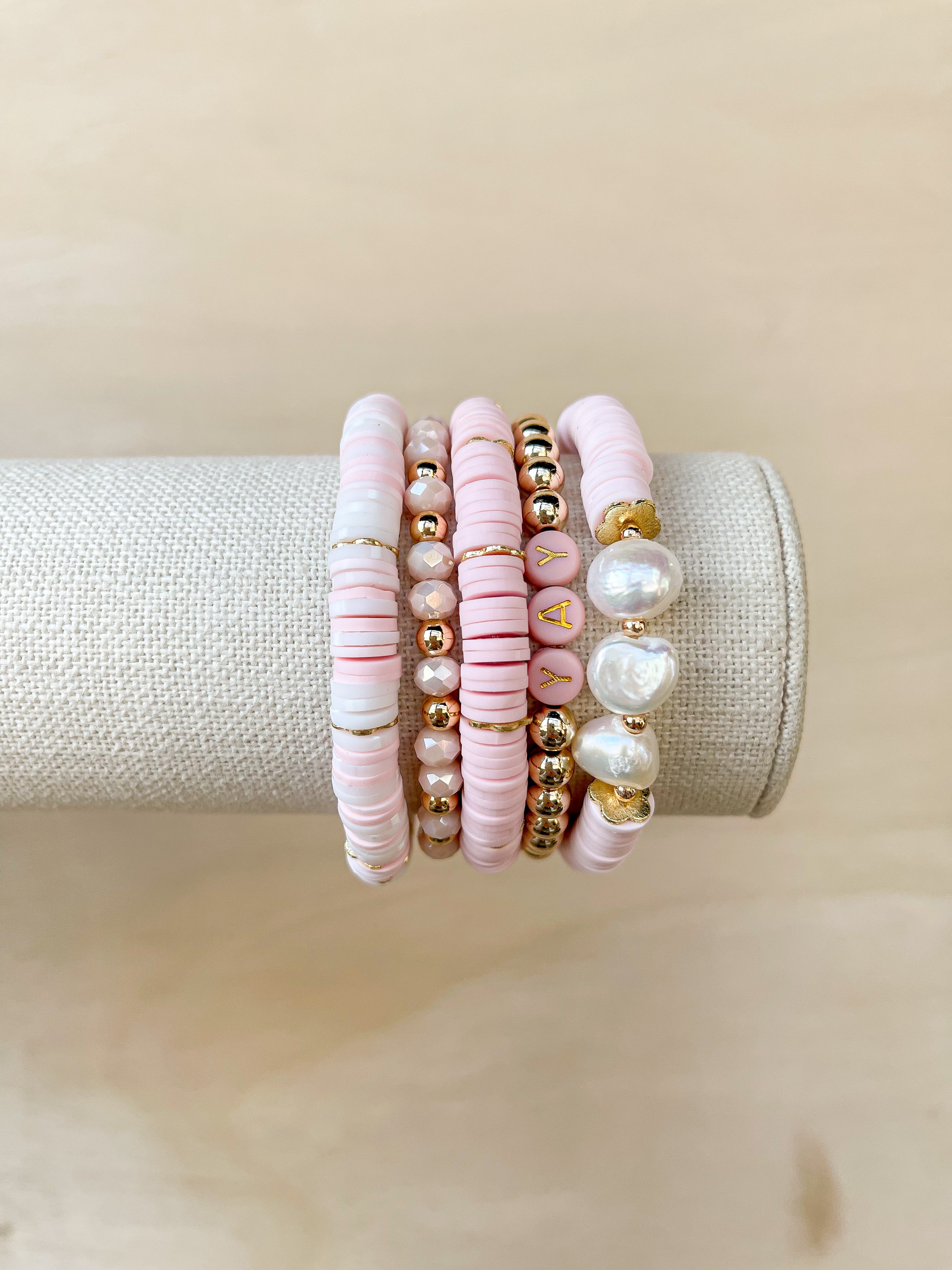 Handmade bracelet, locally made, soft clay bead, stretch bracelet, paired with some other pink callie favorites