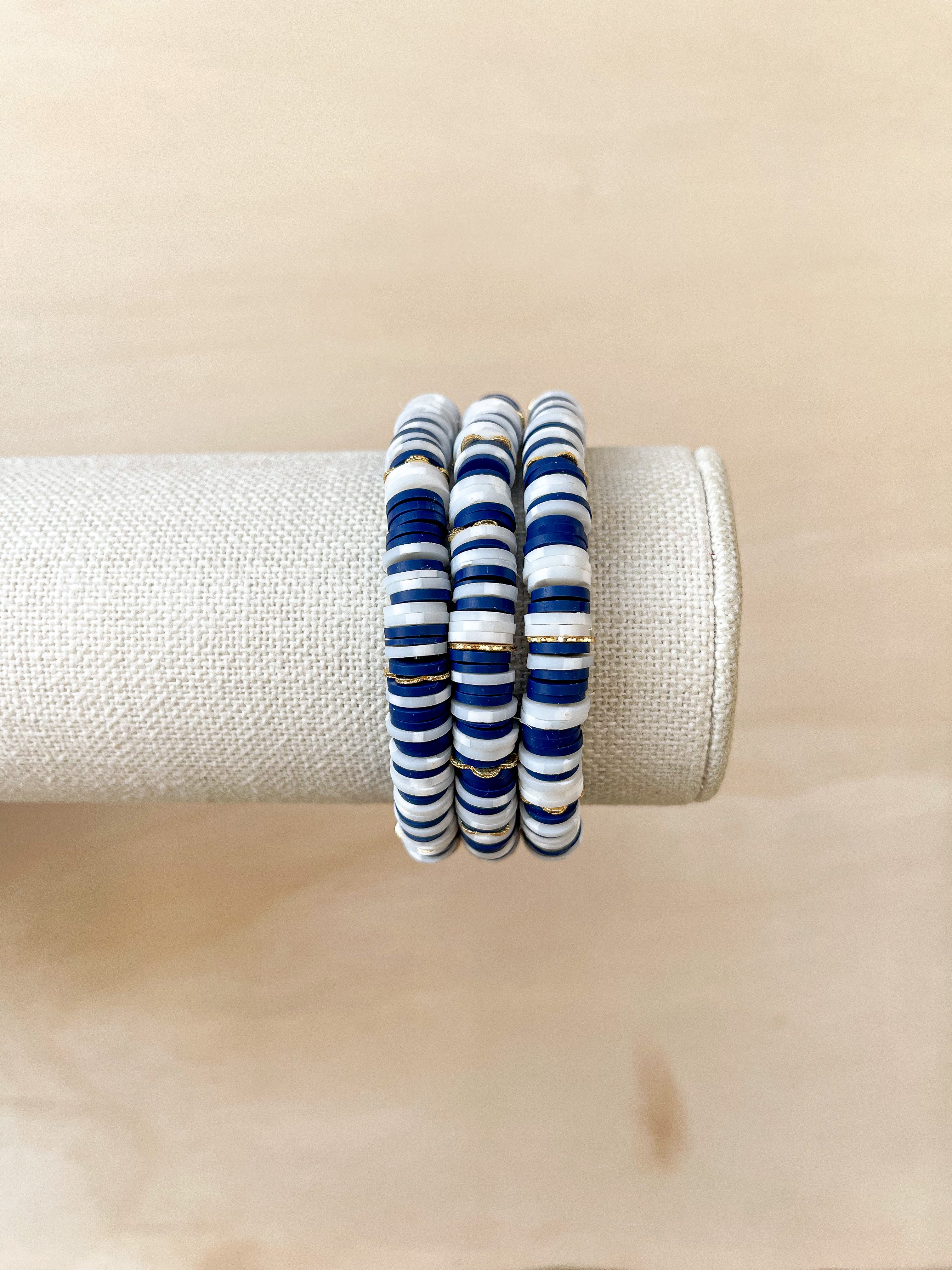 Handmade bracelet, locally made, soft clay bead, stretch bracelet, Navy and white with a stripped pattern