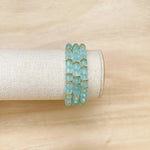 Handmade bracelet, locally made, stretch bracelet, matte teal beads with gold detailed spacers in between