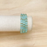 Handmade bracelet, locally made, stretch bracelet, matte teal beads with gold detailed spacers in between