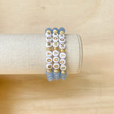 Handmade bracelet, locally made, blue beads, gold lettered beads that say boy mom, gold beads separate the words 