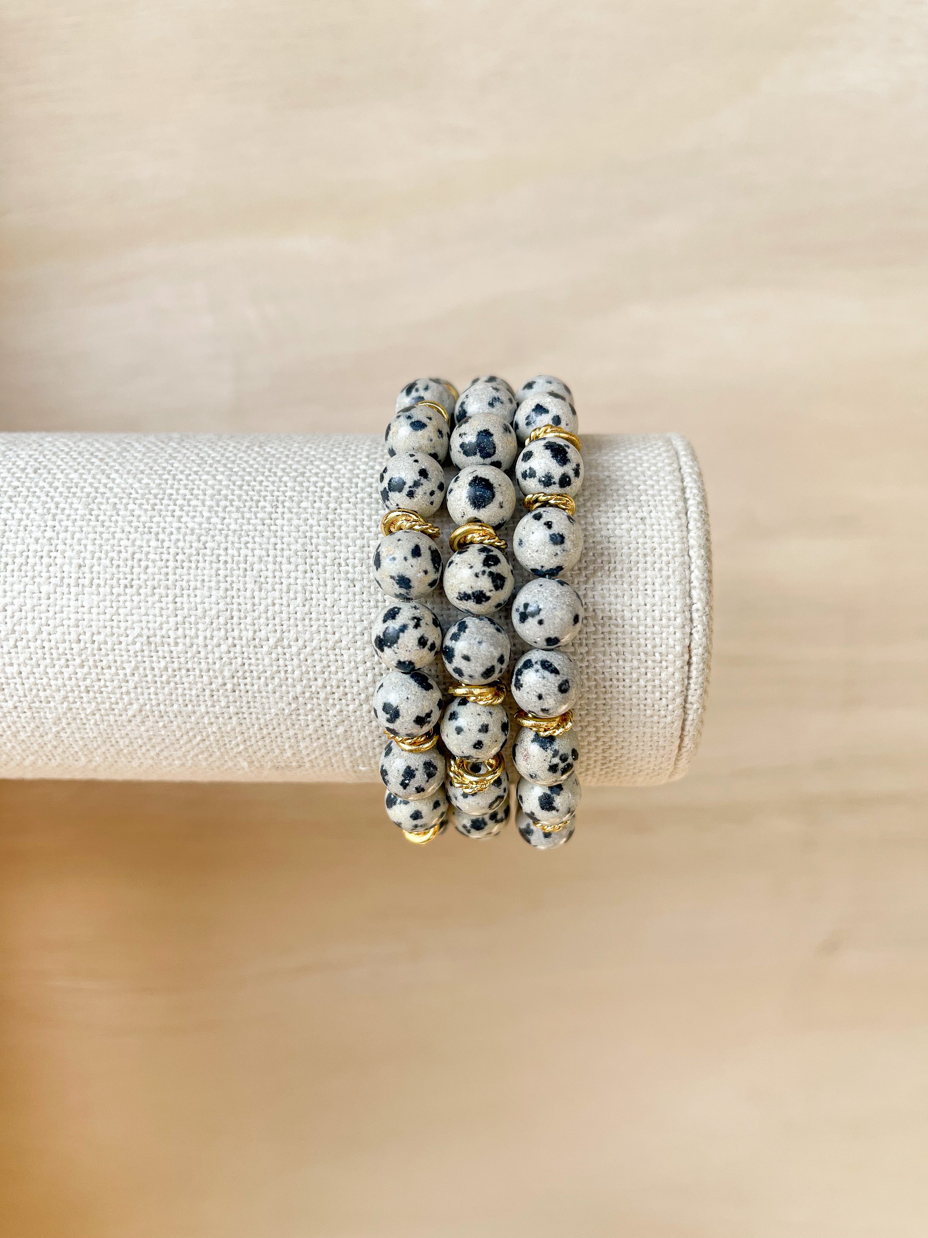 Handmade bracelet, locally made, soft clay bead, stretch bracelet, black and grey speckled beads separated with gold spacers