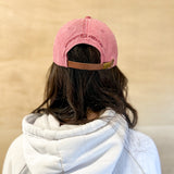 Red baseball cap, red 860 embroidered on the front, red Anchored American embroidered on the back, leather adjustment strap