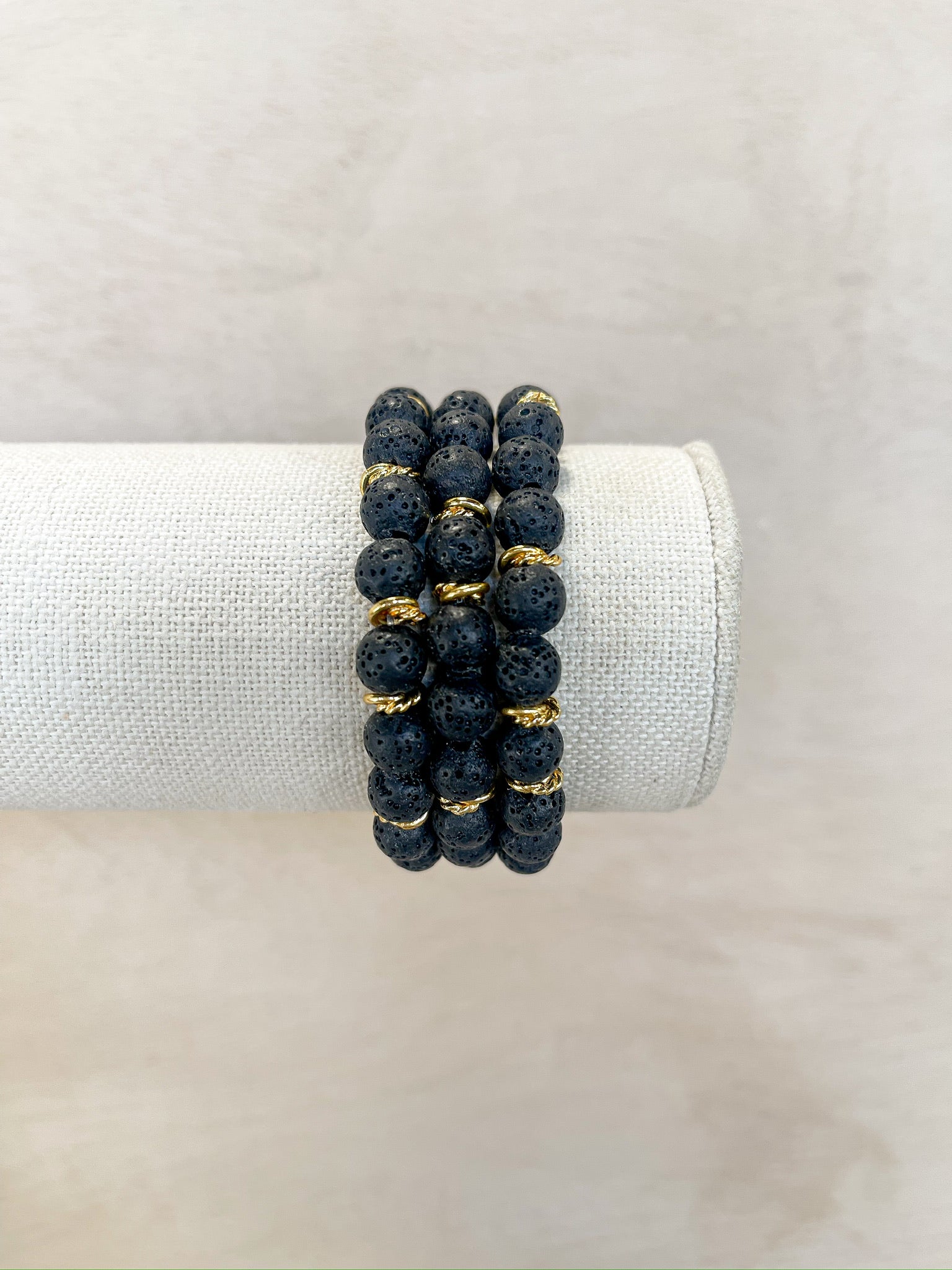 black coral beads, stone beads, separated by gold beads, handmade