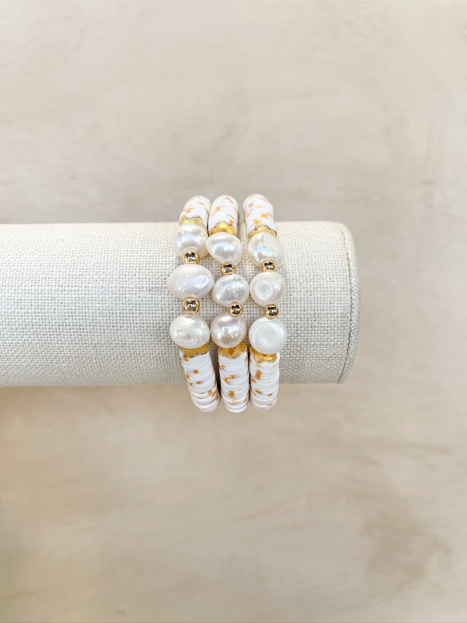white and camel speckled, three pearl beads separated with gold beads, handmade
