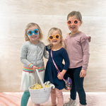 Photo of the girls wearing the custom sunglasses