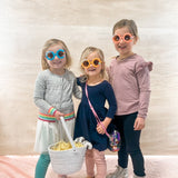 Photo of the girls wearing the custom sunglasses