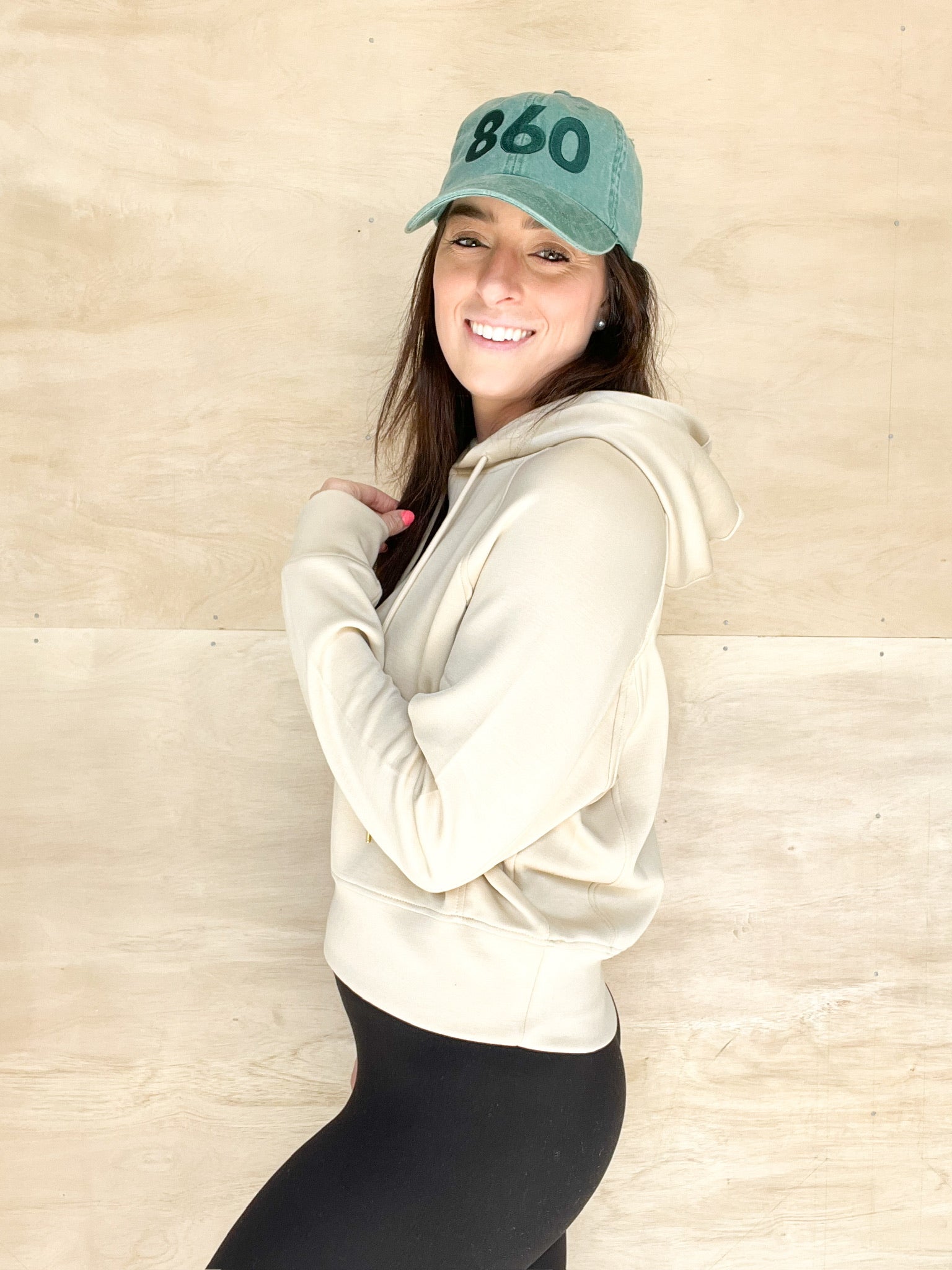 neutral tan cropped hoodie, drawstrings for the neckline, wide waistband