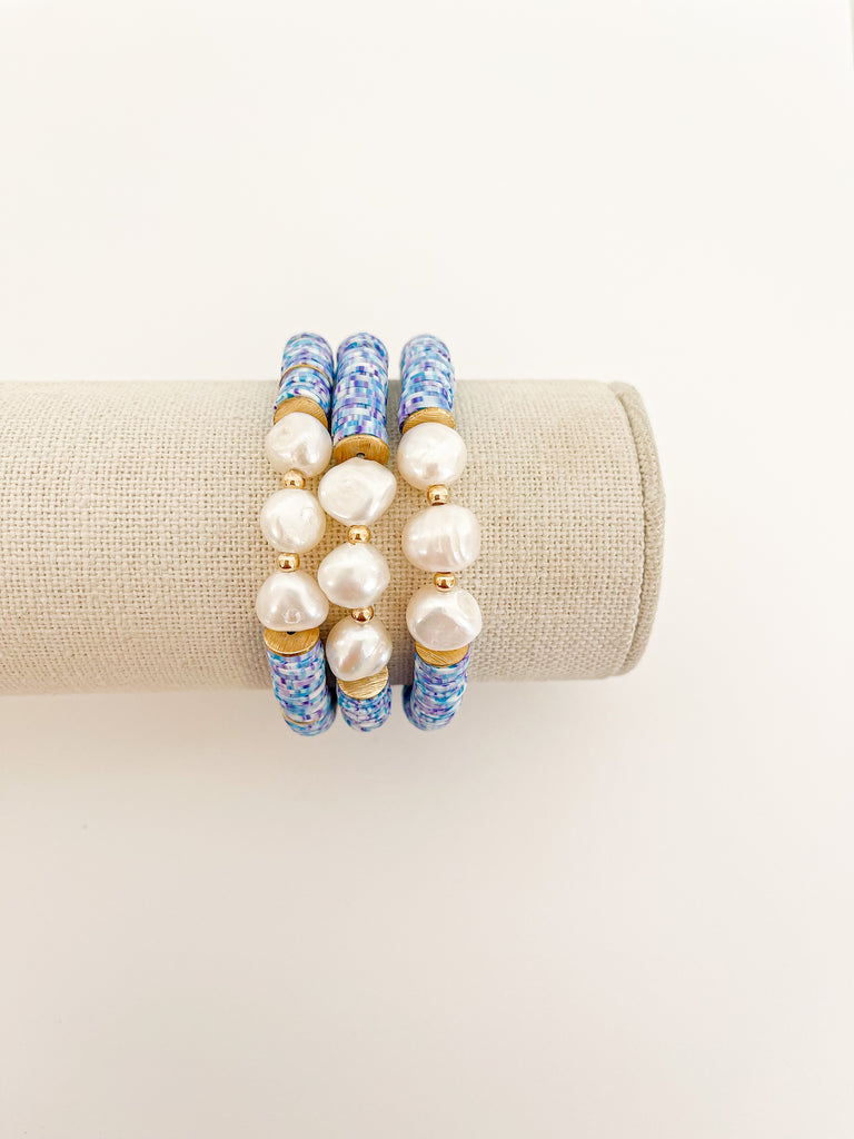 Handmade bracelet, locally made, soft clay bead, stretch bracelet, blue white and purple speckled beads, three pearls with gold beads separating each