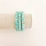 Handmade bracelet, locally made, soft clay bead, stretch bracelet, light and dark green beads with little gold spacers